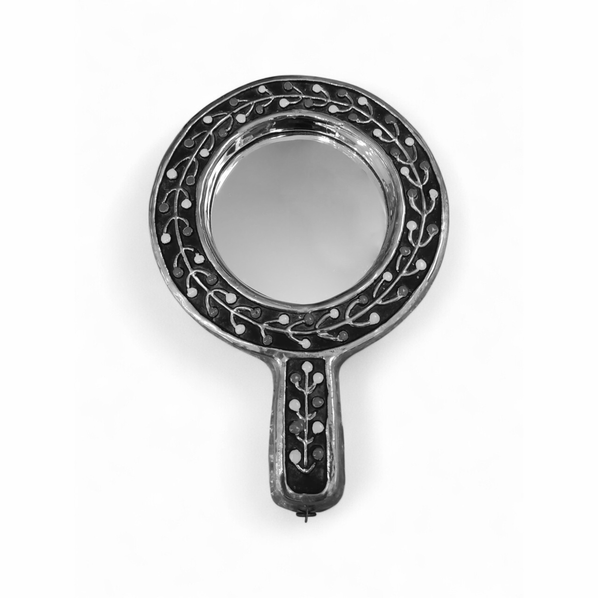Miroir à main en céramique émaillée créé par Mithé Espelt, à décor végétal stylisé
