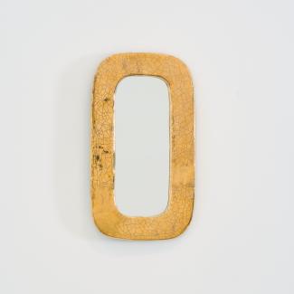 Gilded ceramic oblong mirror by Mithé Espelt, France, circa 1970, with crackled gold glaze and rounded corners
