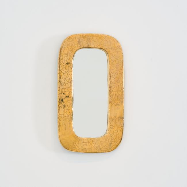 Gilded ceramic oblong mirror by Mithé Espelt, France, circa 1970, with crackled gold glaze and rounded corners